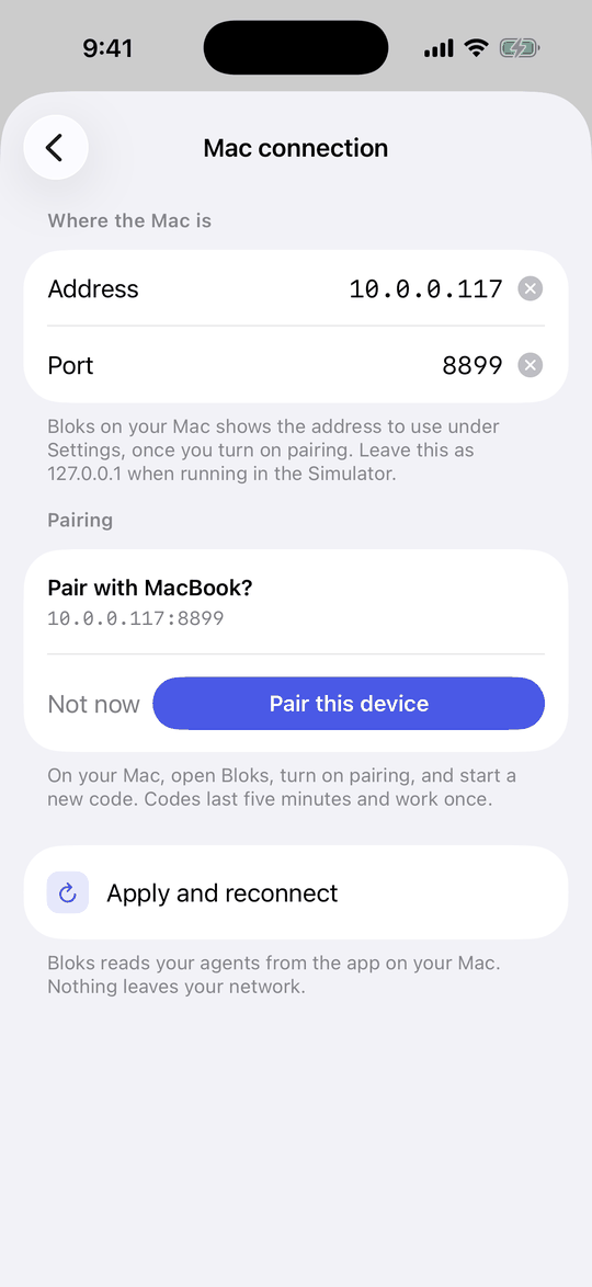 The Mac connection screen asking Pair with MacBook, with the address filled in and a Pair this device button